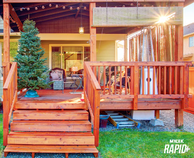 painting decking with a paint sprayer